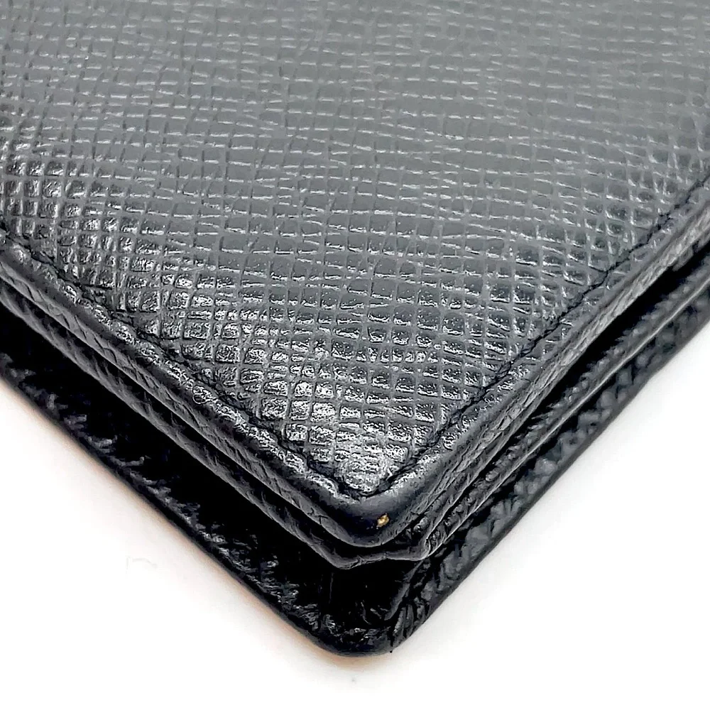 LOUIS VUITTON Black Taiga Porte Monnaie Boite COMES WITH: LV BOX, DUST BAG